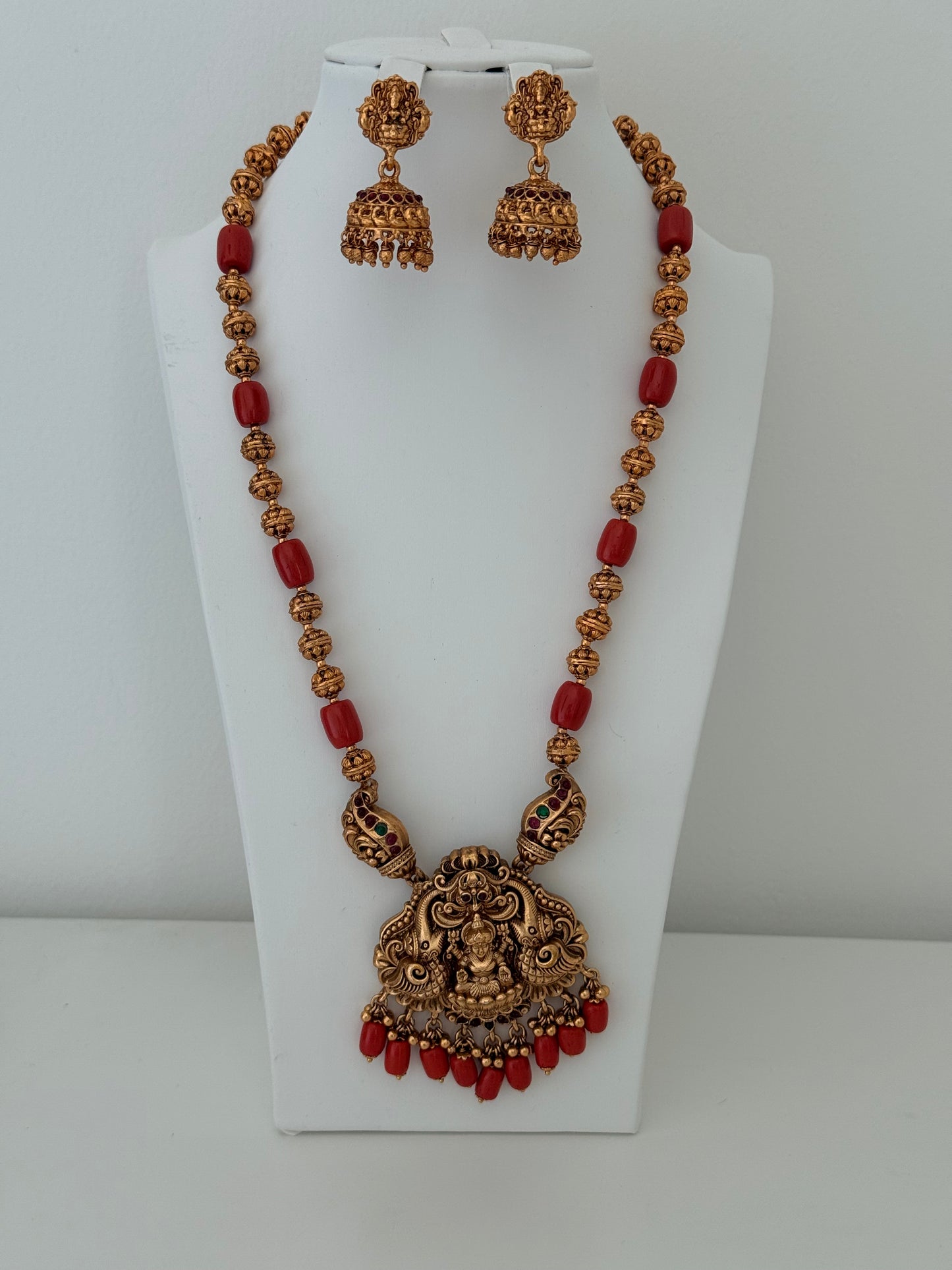 Beautiful Temple Pendant set with Orange Beads and Jhumka