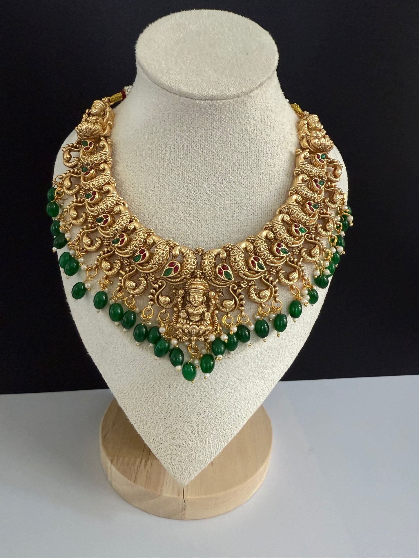 Peacock style designer NS with heavy earring