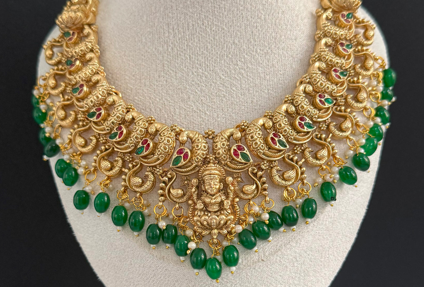 Peacock style designer NS with heavy earring