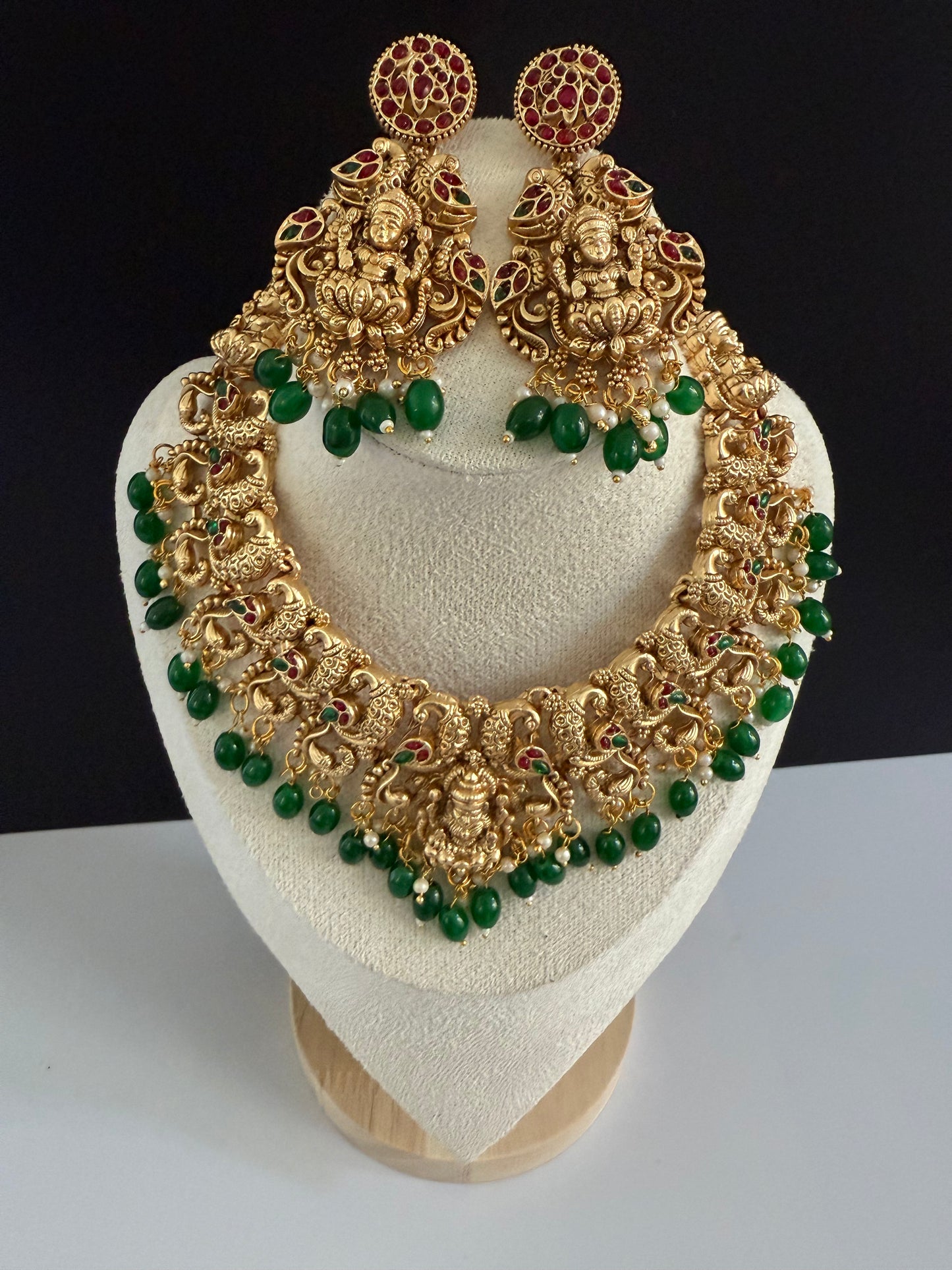 Peacock style designer NS with heavy earring