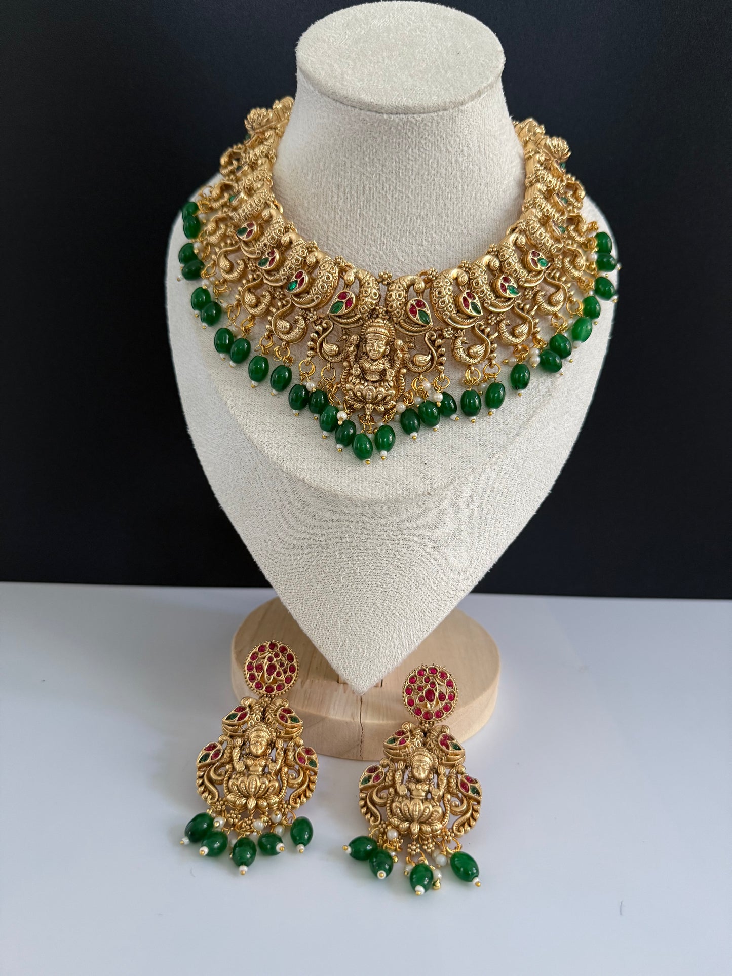 Peacock style designer NS with heavy earring