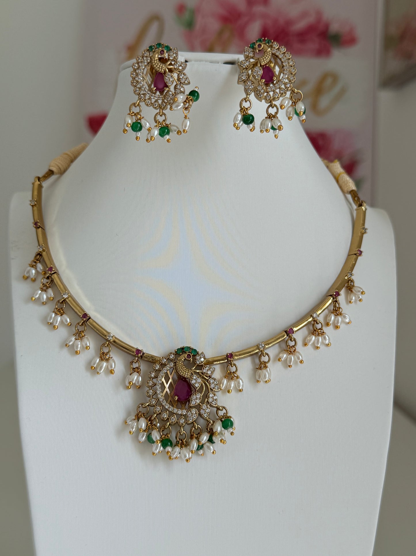 Peacock themed Simple Partywear NS with pearl detailing